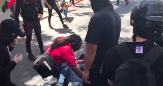 “Reveal” host Al Letson said, “I just put my body down on top of his, in the hopes that they would not hit me.” (Credit: Shane Bauer)